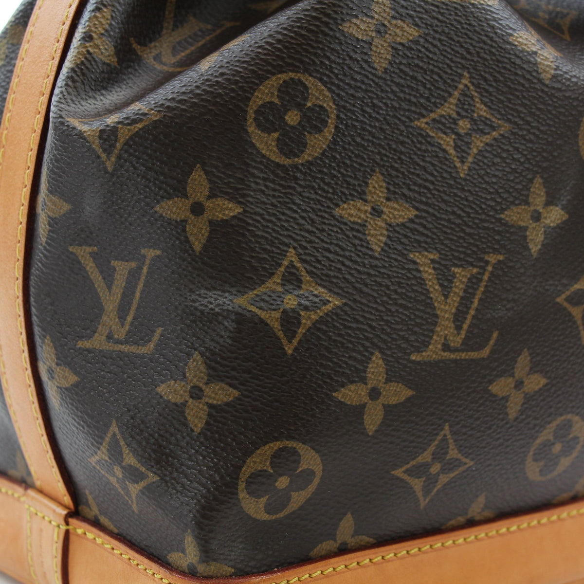 Louis Vuitton Noé BB Monogram Bucket Bag handbag with gold-tone hardware and adjustable strap, featuring classic monogram canvas.