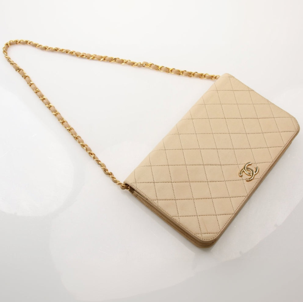 Gold & Beyond Chanel Coco Mark Matelassé Lambskin Shoulder Bag, elegant handbag with quilted lambskin leather and classic design.