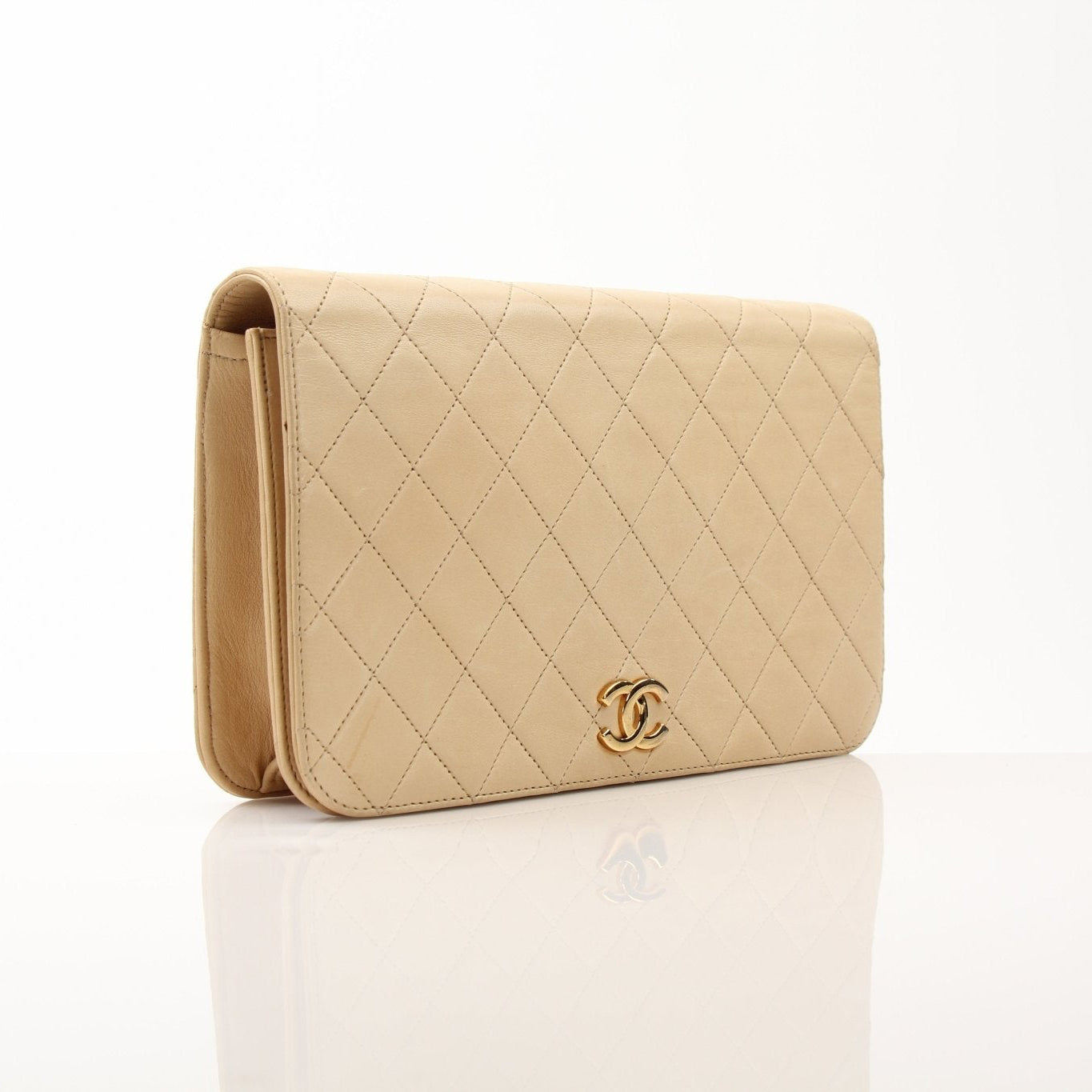 Gold & Beyond Chanel Coco Mark Matelassé Lambskin Shoulder Bag, elegant beige handbag with quilted design and gold-tone hardware.