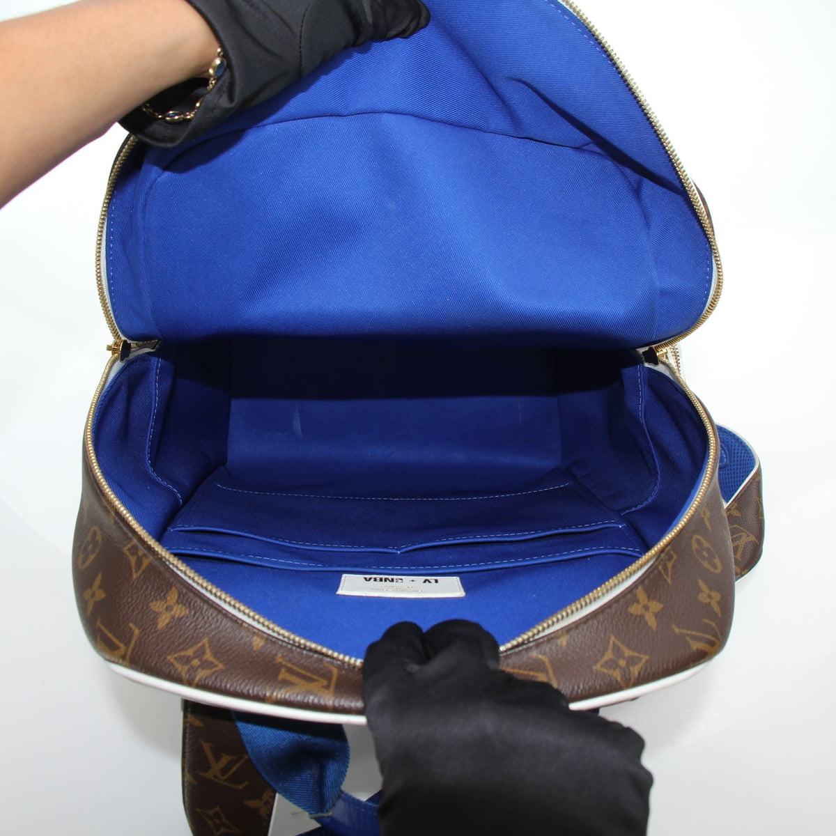 Louis Vuitton x NBA monogram travel backpack by Gold & Beyond, featuring iconic monogram pattern and spacious design.