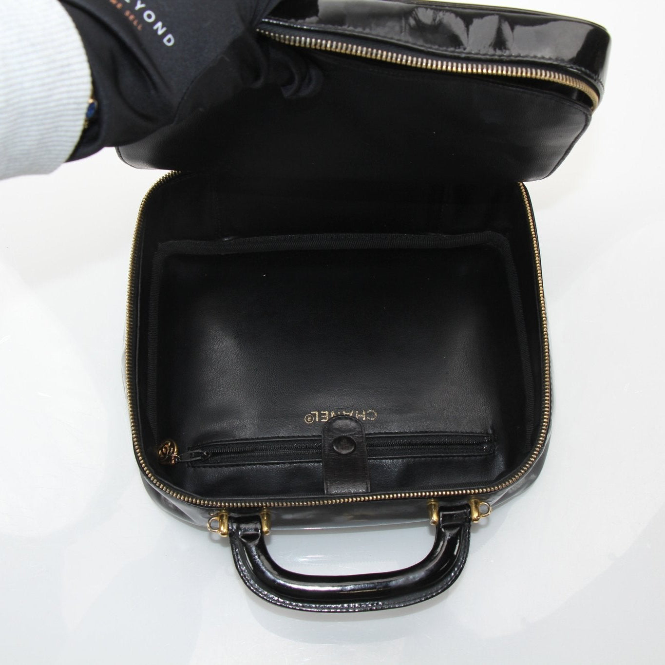 Gold & Beyond Chanel Coco Mark Patent 2-Way Handbag with gold chain strap and signature logo embellishments.