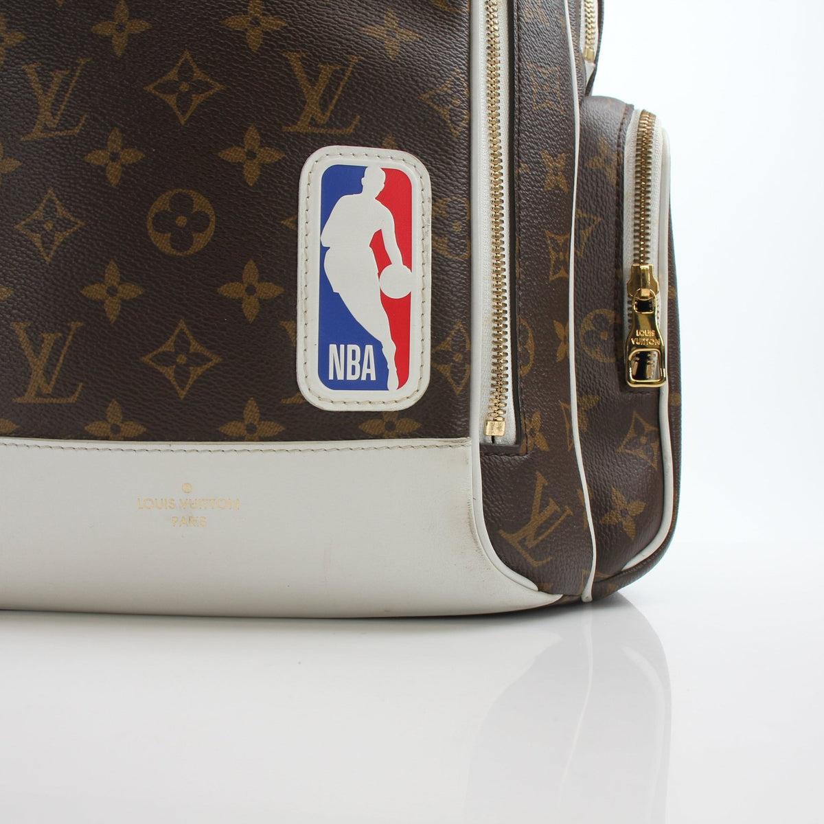 Louis Vuitton x NBA Monogram travel backpack with gold accents from Gold & Beyond, featuring a stylish monogram design.