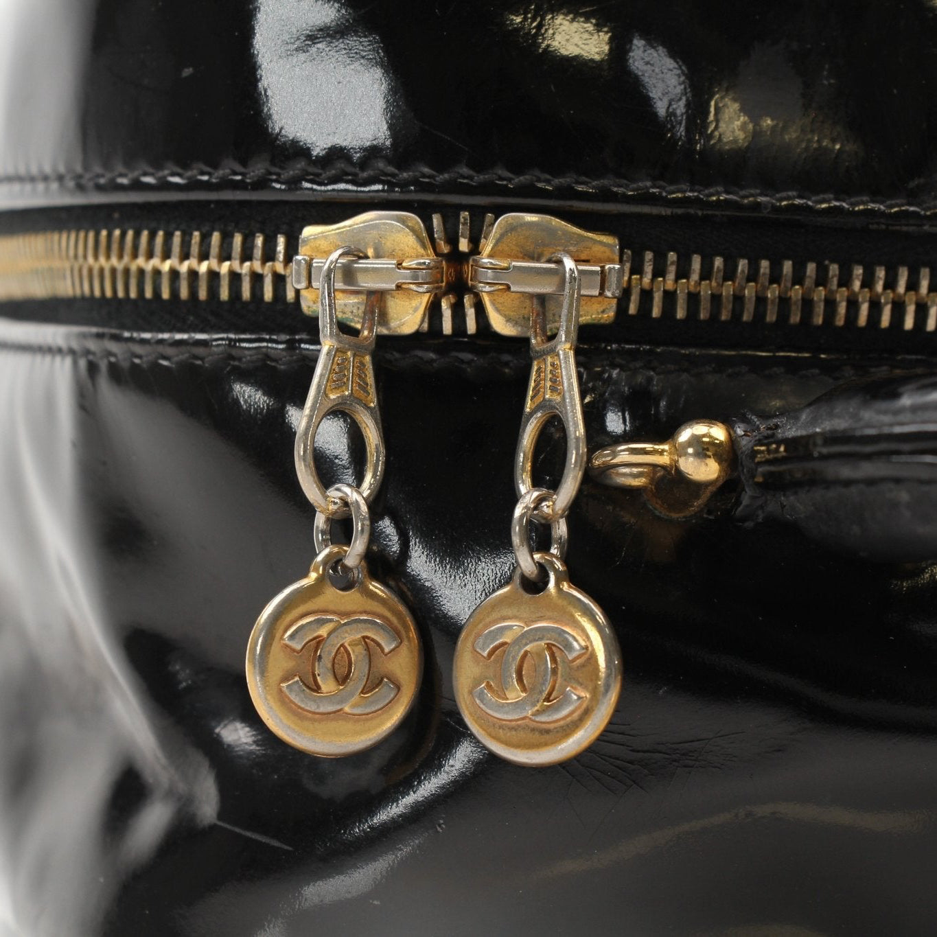 Gold & Beyond Chanel Coco Mark Patent 2-Way Handbag with gold hardware and structured design, showcasing elegant style.