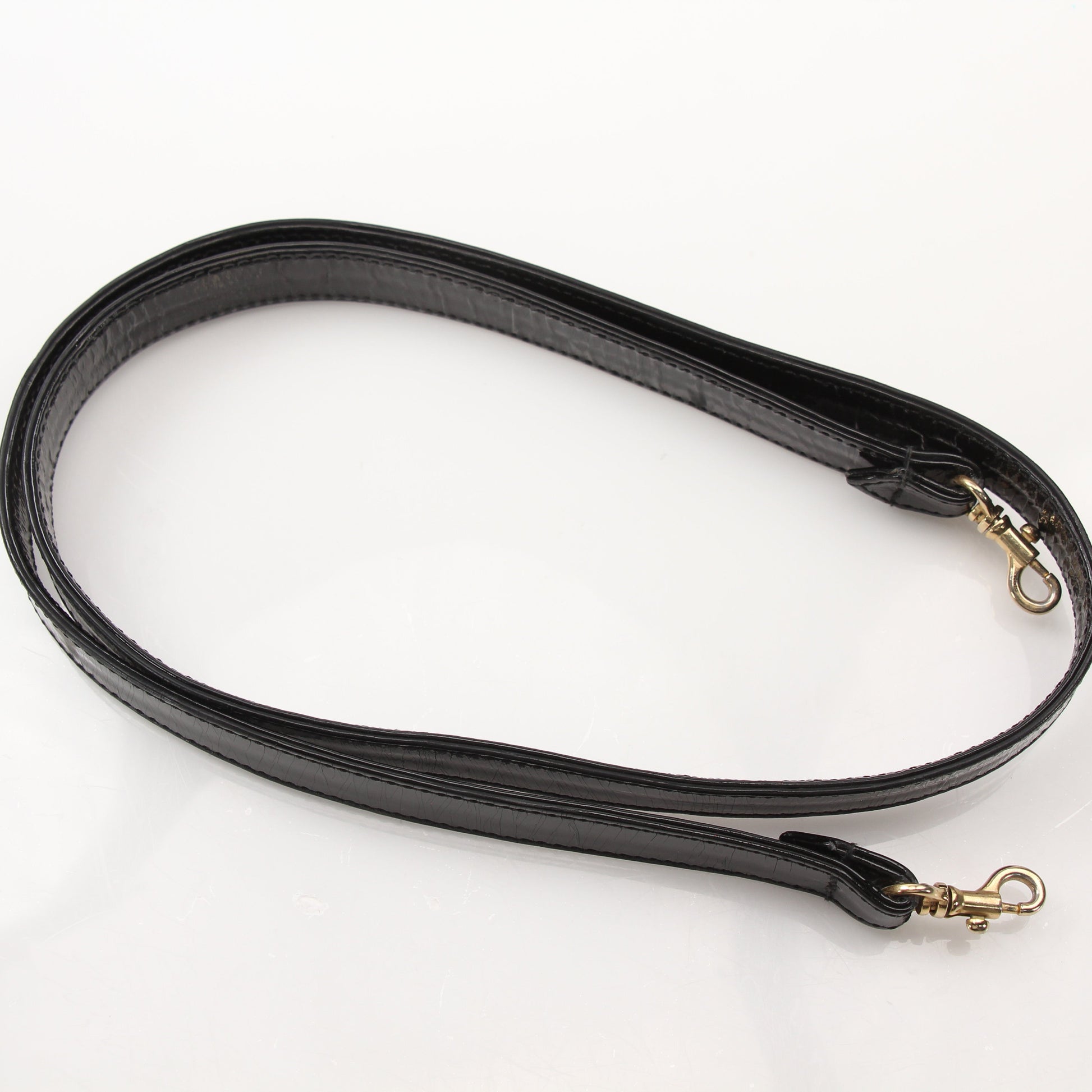 Gold & Beyond Chanel Coco Mark Patent 2-Way Handbag with gold hardware and quilted design, showcasing its luxurious style.