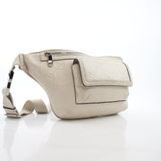 Gucci GG Tennis embossed pocket belt bag in mystic white with gold accents, featuring a compact handbag design and adjustable strap.