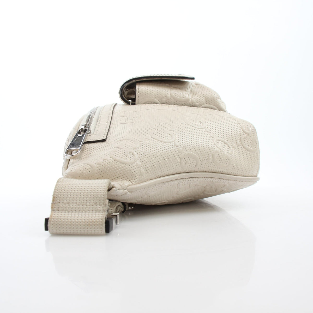 Gucci GG Tennis embossed pocket belt bag in mystic white, stylish handbag with adjustable strap and signature logo details.