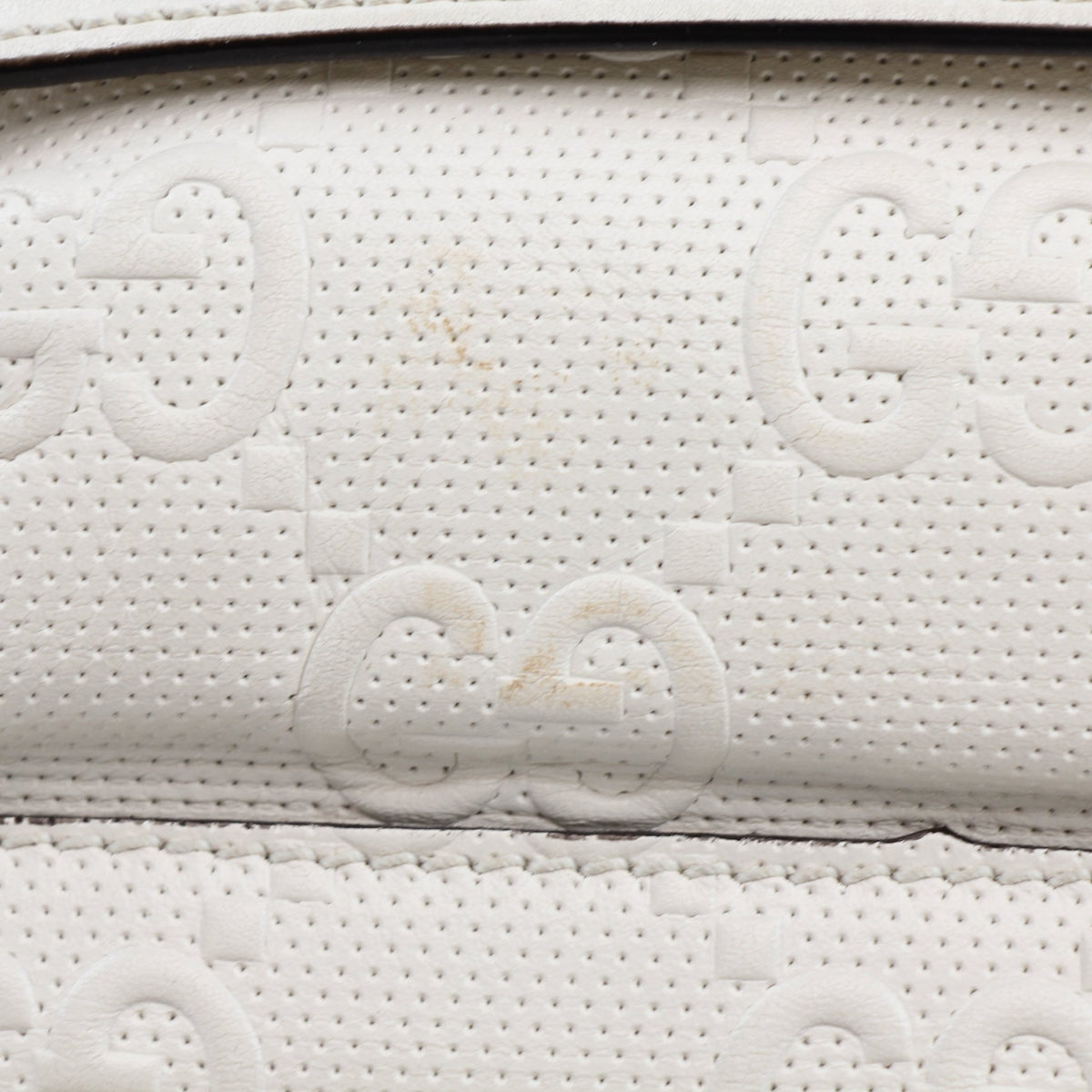 Gucci GG Tennis embossed pocket belt bag in mystic white with adjustable strap and gold hardware, stylish and compact handbag.