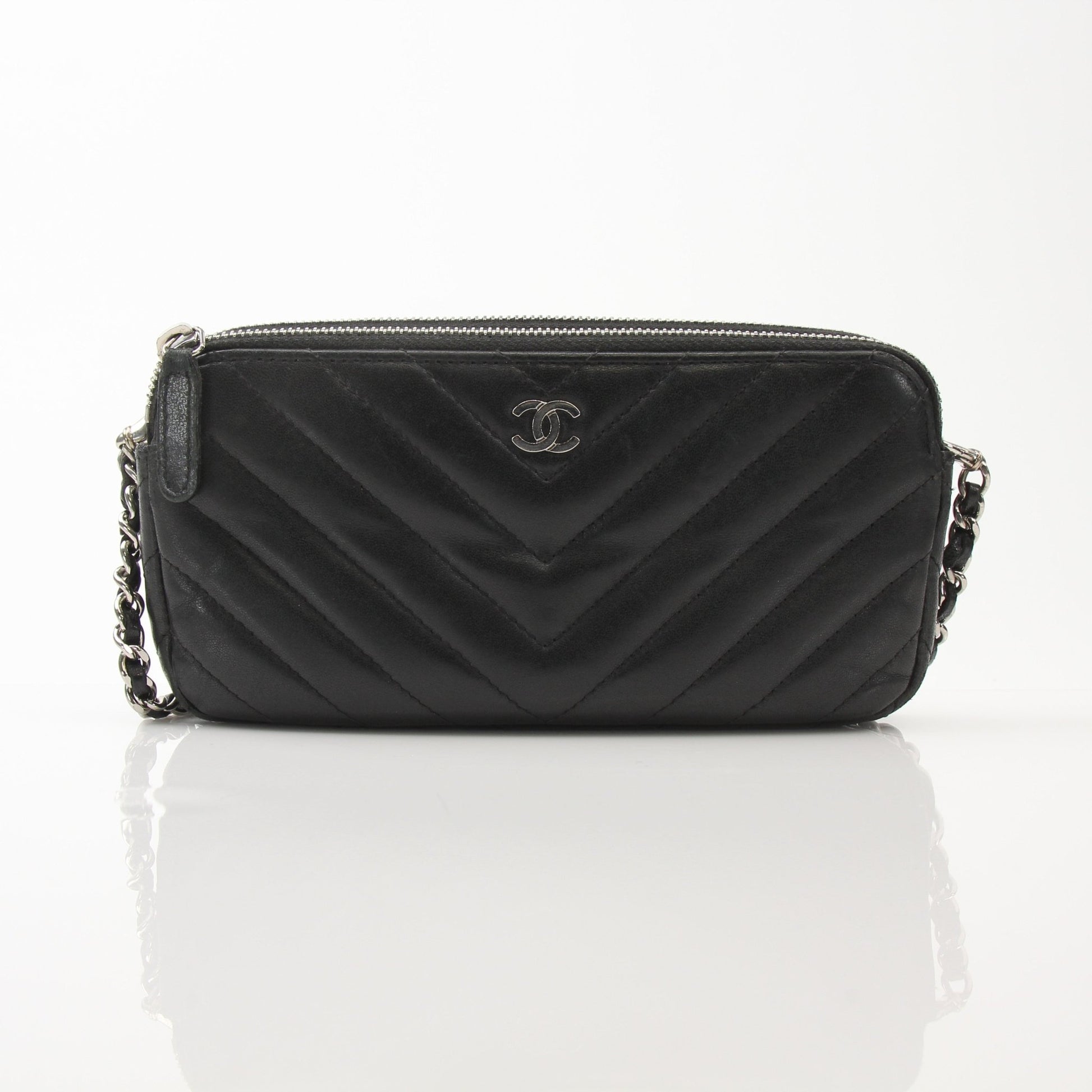 Chanel V-Stitch Chevron Lambskin 2-Way Chain Handbag with gold hardware and classic design, featuring quilted pattern and chain strap.