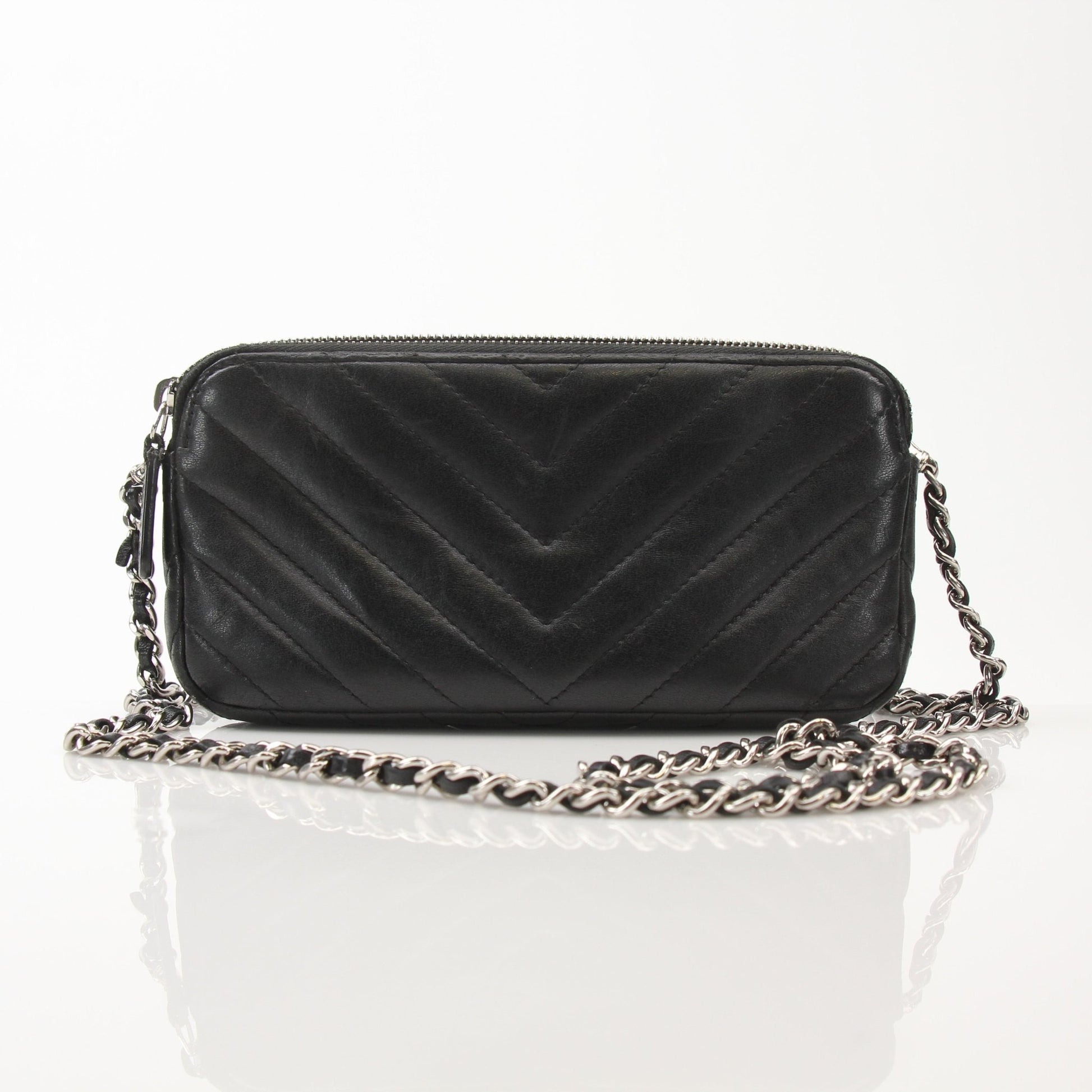 Chanel V-Stitch Chevron Lambskin 2-Way Chain Bag featuring gold hardware, quilted design, and versatile carrying options.