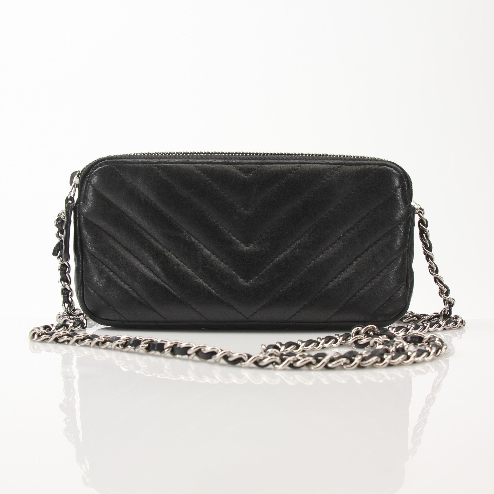 Chanel V-Stitch Chevron Lambskin 2-Way Chain Bag featuring gold hardware, quilted design, and versatile carrying options.