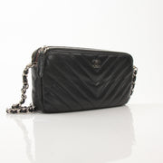 Chanel V-Stitch Chevron Lambskin 2-Way Chain Handbag with gold hardware, featuring a classic quilted design and versatile strap.