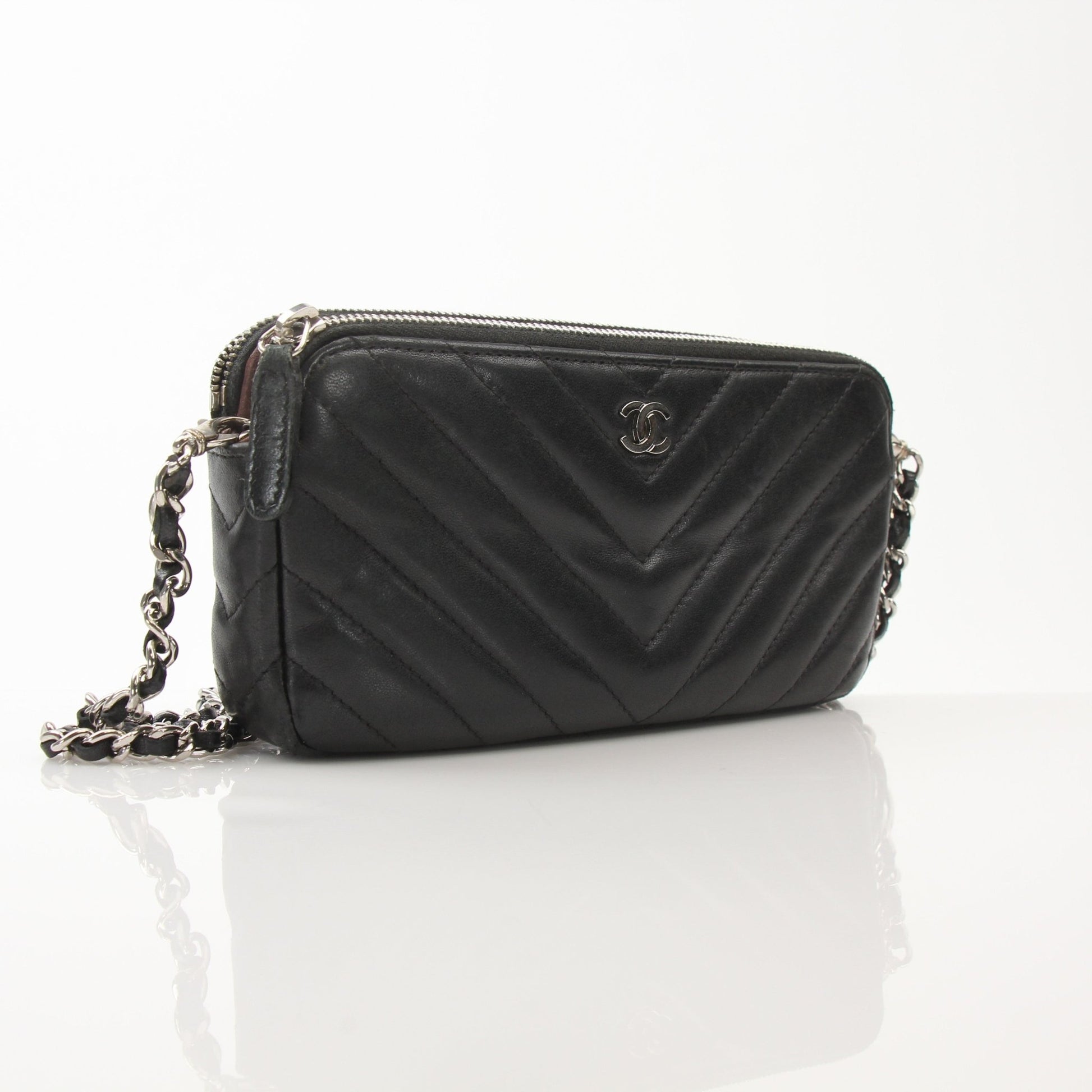Chanel V-Stitch Chevron Lambskin 2-Way Chain Handbag with gold hardware, featuring a classic quilted design and versatile strap.