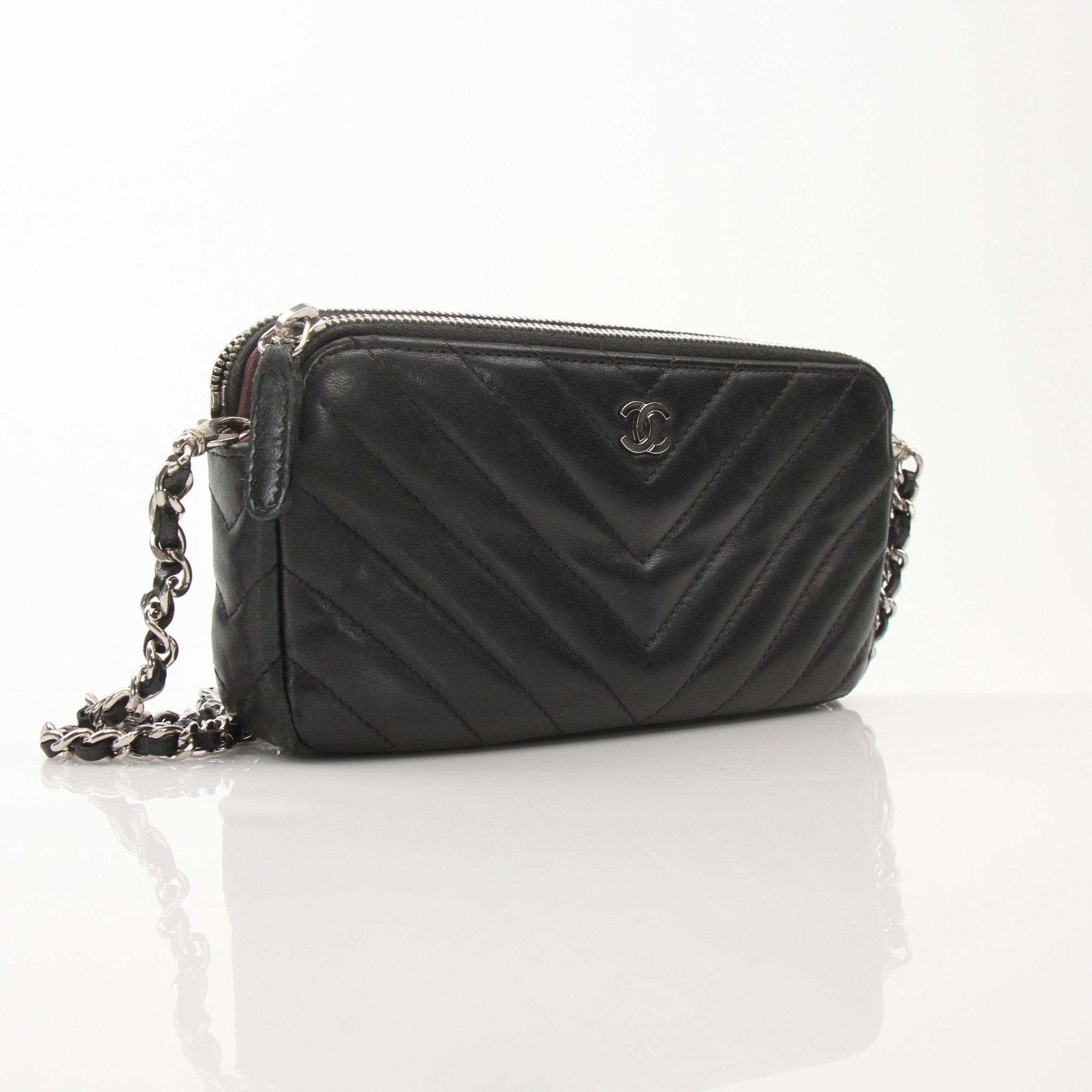 Chanel V-Stitch Chevron Lambskin 2-Way Chain Handbag with gold hardware, featuring a classic quilted design and versatile strap.