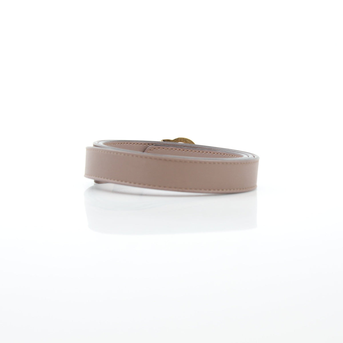 Taupe Gucci GG Marmont thin leather belt featuring gold-tone hardware, designed as a stylish accessories piece.