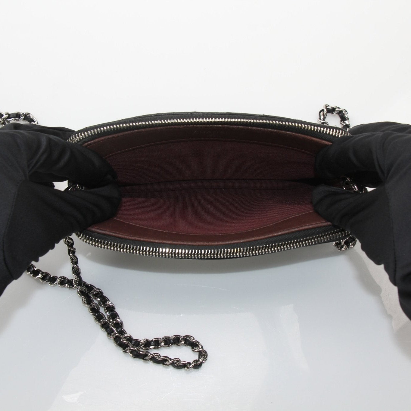 Gold & Beyond Chanel V-Stitch Chevron Lambskin 2 Way Chain Bag, luxurious handbag with V-stitch design and chain strap.