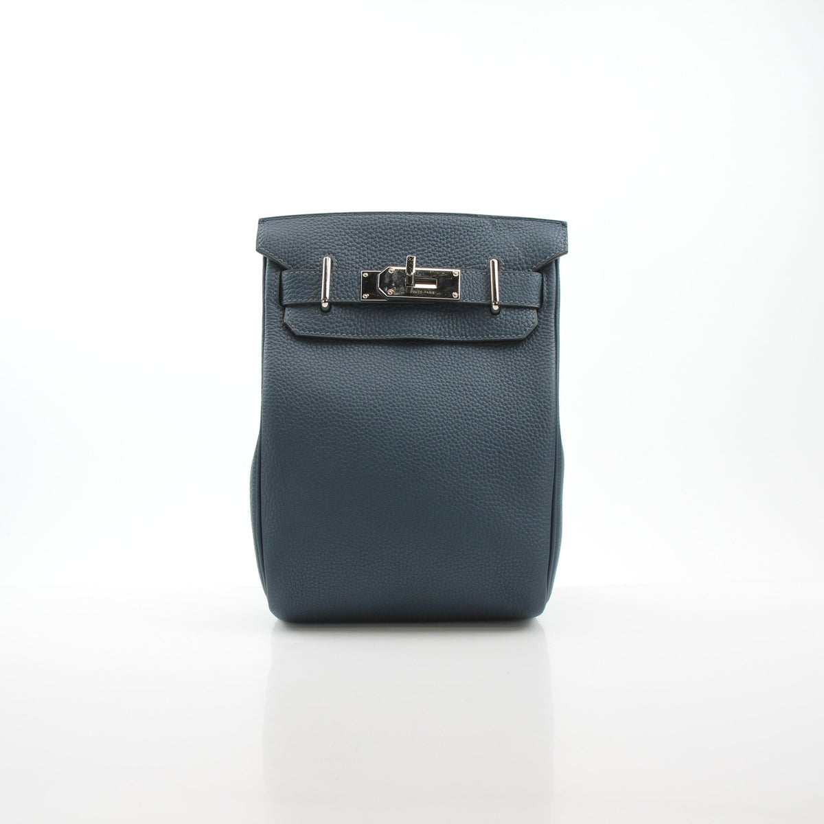 Hermès Hac a Dos PM dark blue Togo calfskin backpack with adjustable straps and gold hardware, displayed with its flap open.