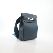 Hermès Hac a Dos PM dark blue Togo calfskin backpack featuring adjustable straps and sleek handbag design.