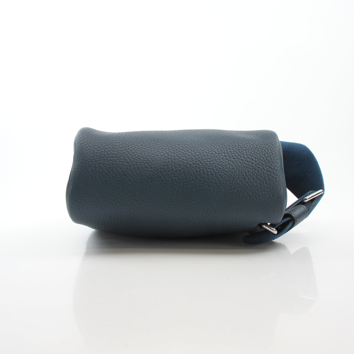 Dark blue Hermès Hac a Dos PM Togo calfskin backpack with adjustable straps and silver hardware, showcasing elegant craftsmanship.