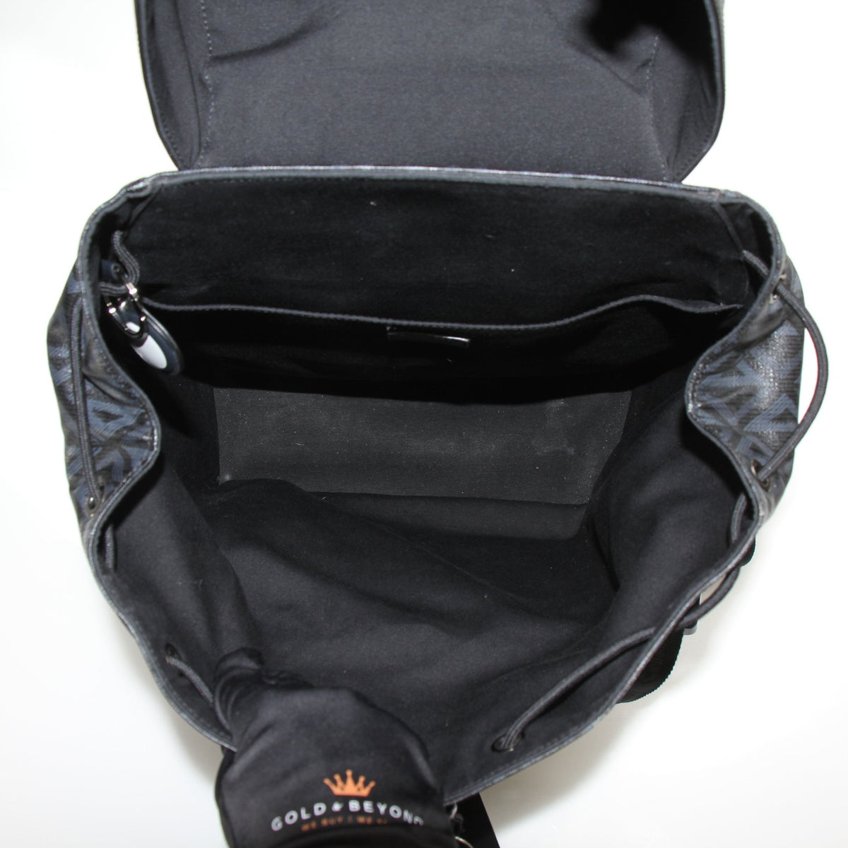 Christian Dior Men’s Hit the Road CD Diamond backpack in black with adjustable straps and front logo patch, designed for travel.