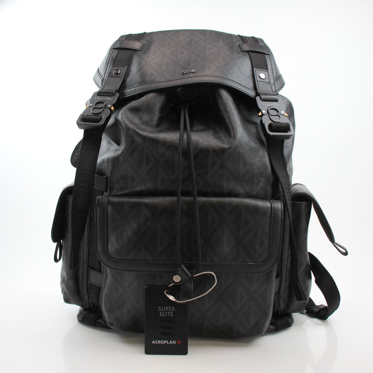 Christian Dior men's Hit the Road CD Diamond backpack in black, stylish travel bag with diamond pattern and adjustable straps.