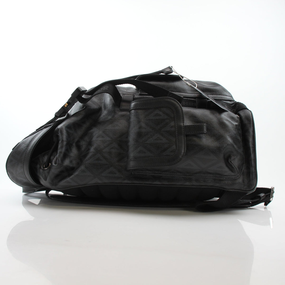 Christian Dior men's Hit the Road CD Diamond backpack in black, stylish travel bag with diamond pattern details.