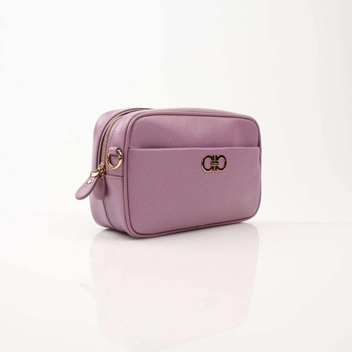 Pink Salvatore Ferragamo Gancini crossbody handbag with gold chain strap and logo details, stylish accessory for women.