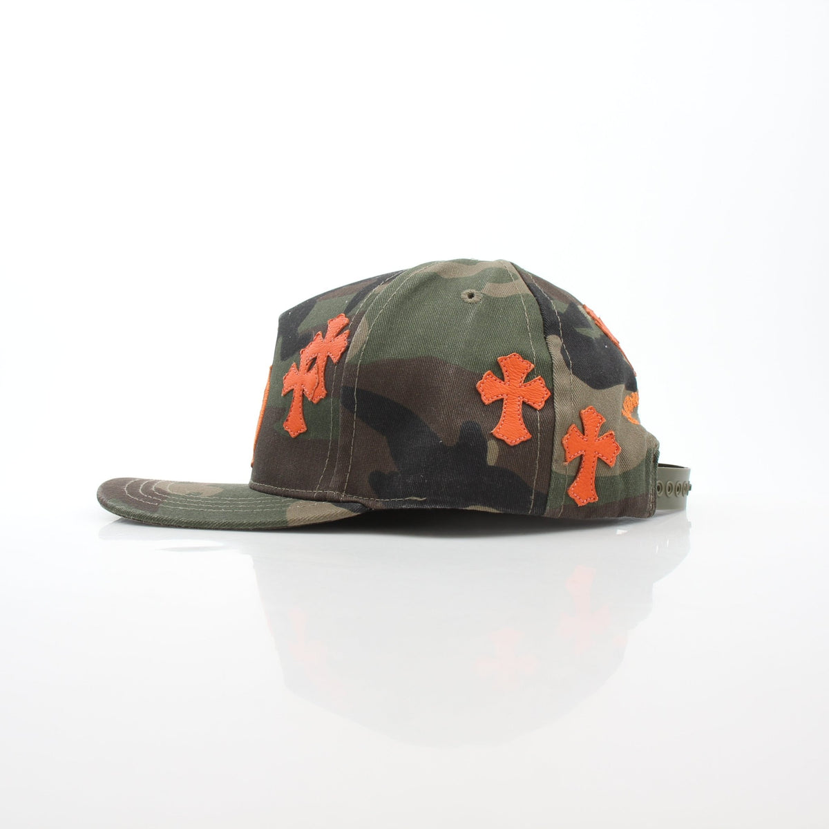Chrome Hearts camo orange cemetery cross patch baseball hat with adjustable strap and embroidered logo detail.