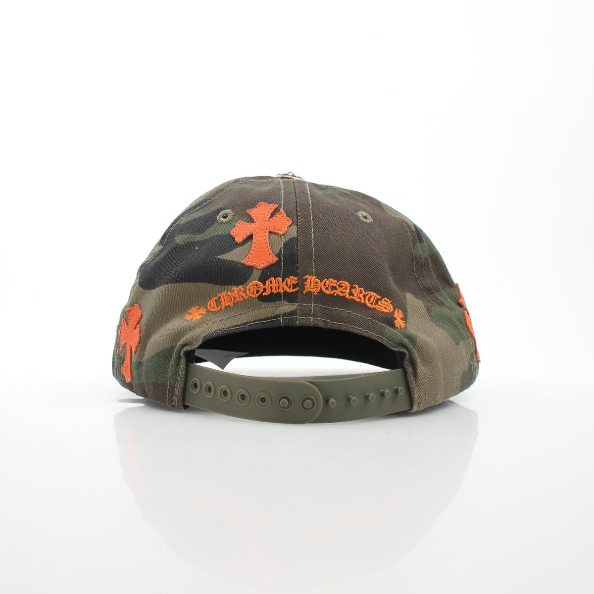 Chrome Hearts Camo Orange Cemetery Cross patch on a baseball hat, gold accents, casual accessories by Gold & Beyond.