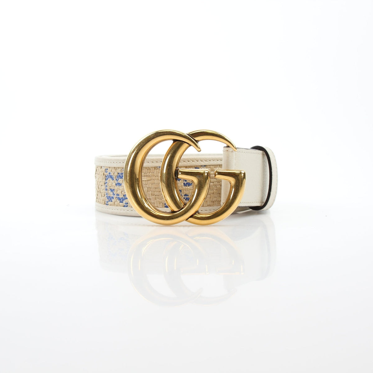 Gucci GG Marmont raffia belt in natural ivory and blue, stylish accessory with gold hardware, worn around the waist.