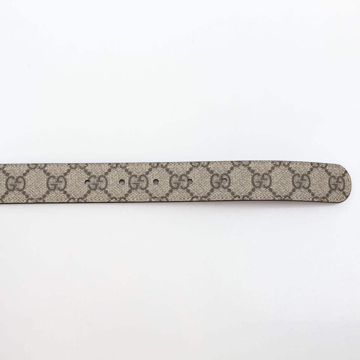 Gucci Double G belt in beige ebony with red accents, stylish accessories featuring the iconic logo design.