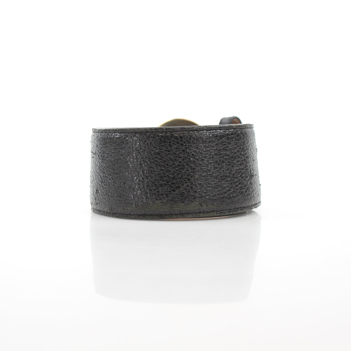 Christian Dior Cause Bee oval buckle belt in black grained calfskin leather, featuring a gold-tone buckle with bee detail.
