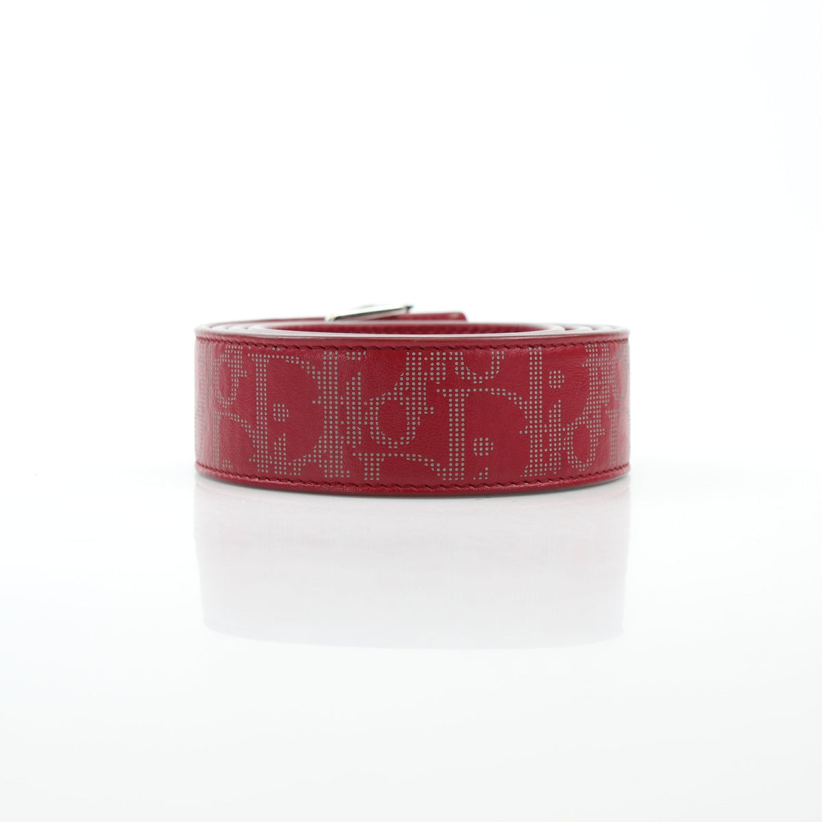 Christian Dior World Tour Oblique Galaxy reversible belt in red calfskin leather, showcasing its luxurious design and reversible feature.