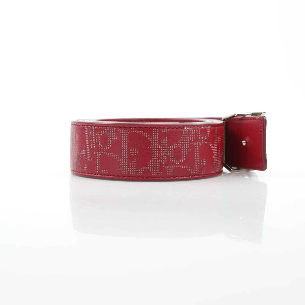 Christian Dior World Tour Oblique Galaxy reversible belt in red calfskin leather, featuring Dior branding and metallic buckle detail.