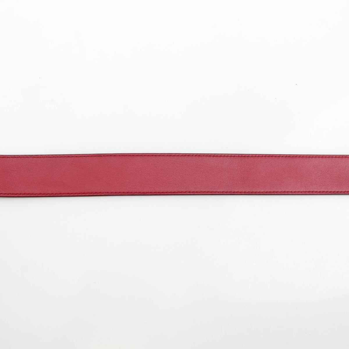 Christian Dior World Tour Oblique Galaxy reversible belt in red calfskin leather, featuring Dior branding and stylish design.
