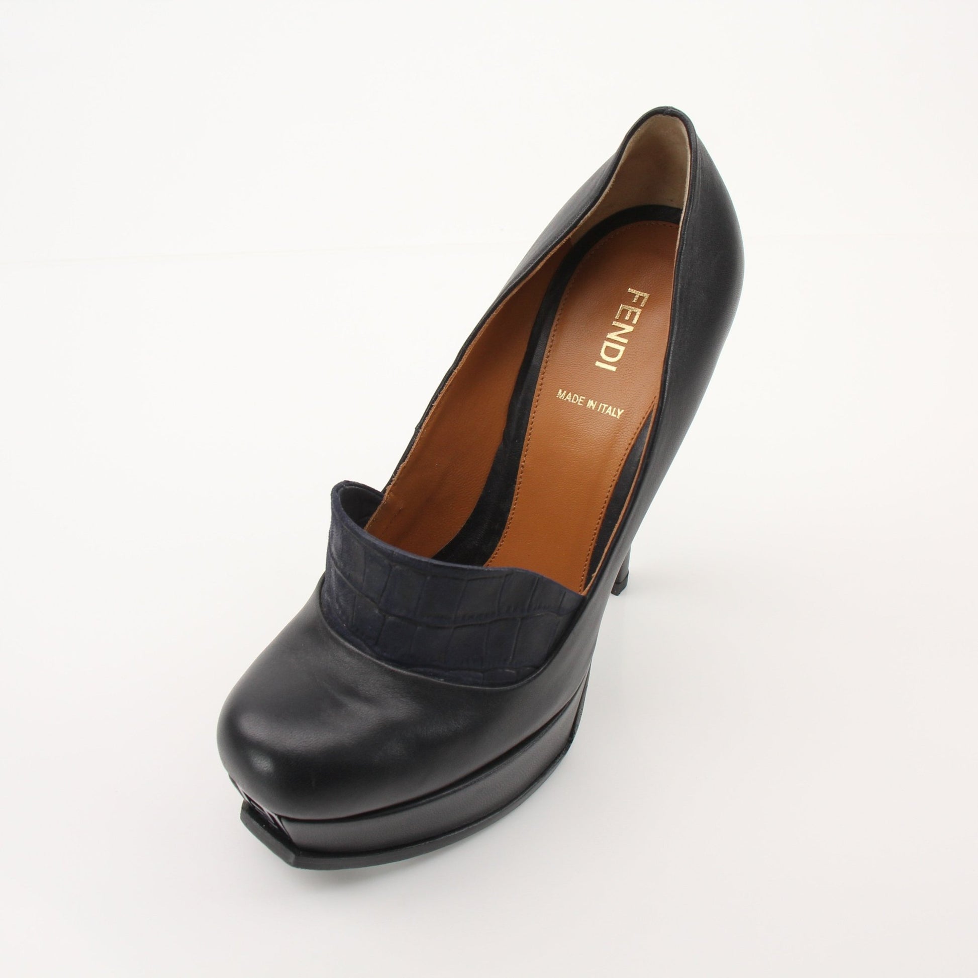 Gold & Beyond Fendi Fendista platform heels featuring a sleek design, high stiletto heel, and elegant craftsmanship.