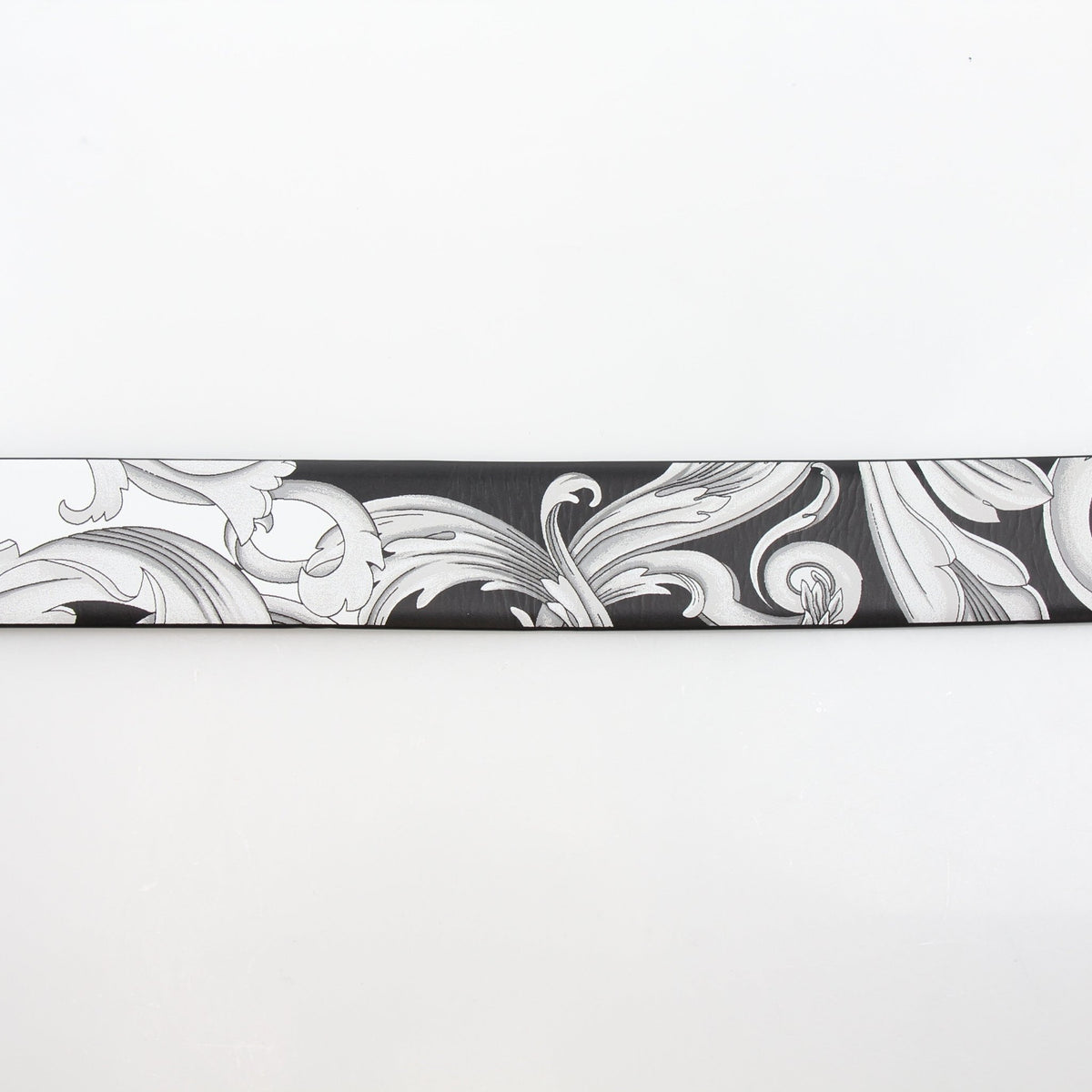 Versace men's Medusa Barocco Istante reversible belt in black and white calfskin leather, showcasing the iconic Medusa buckle.