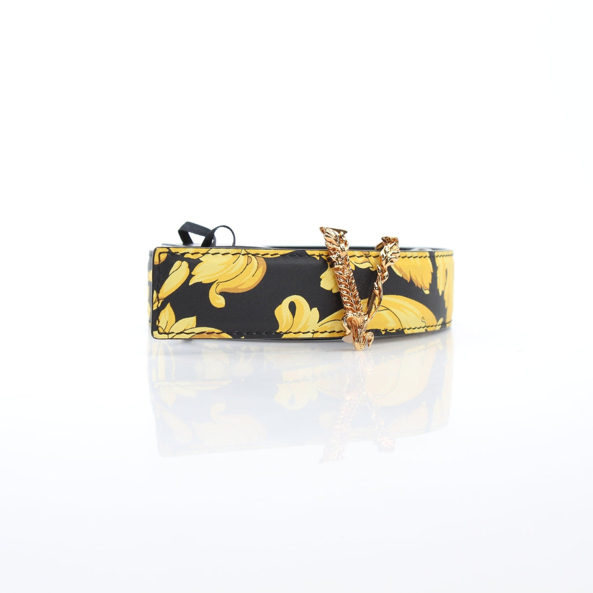 Black and gold calfskin leather Versace Women’s Virtus Barocco print belt, accessory with intricate design and gold-tone details.