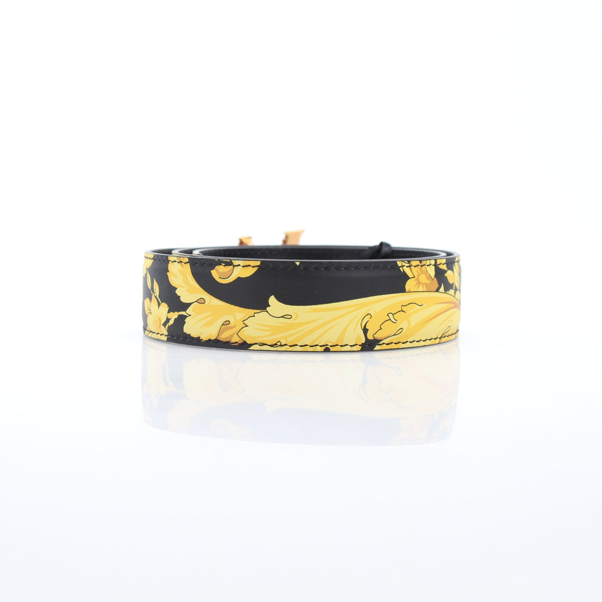 Black and gold calfskin leather Versace women’s Virtus Barocco print belt, stylish accessory with gold detailing.