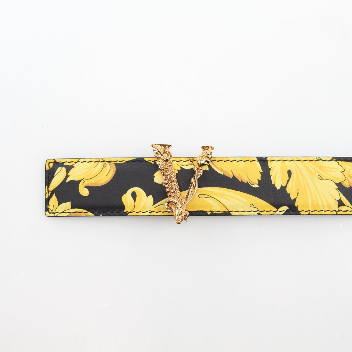 Versace women's Virtus Barocco print belt in black and gold calfskin leather, stylish accessory with intricate design.