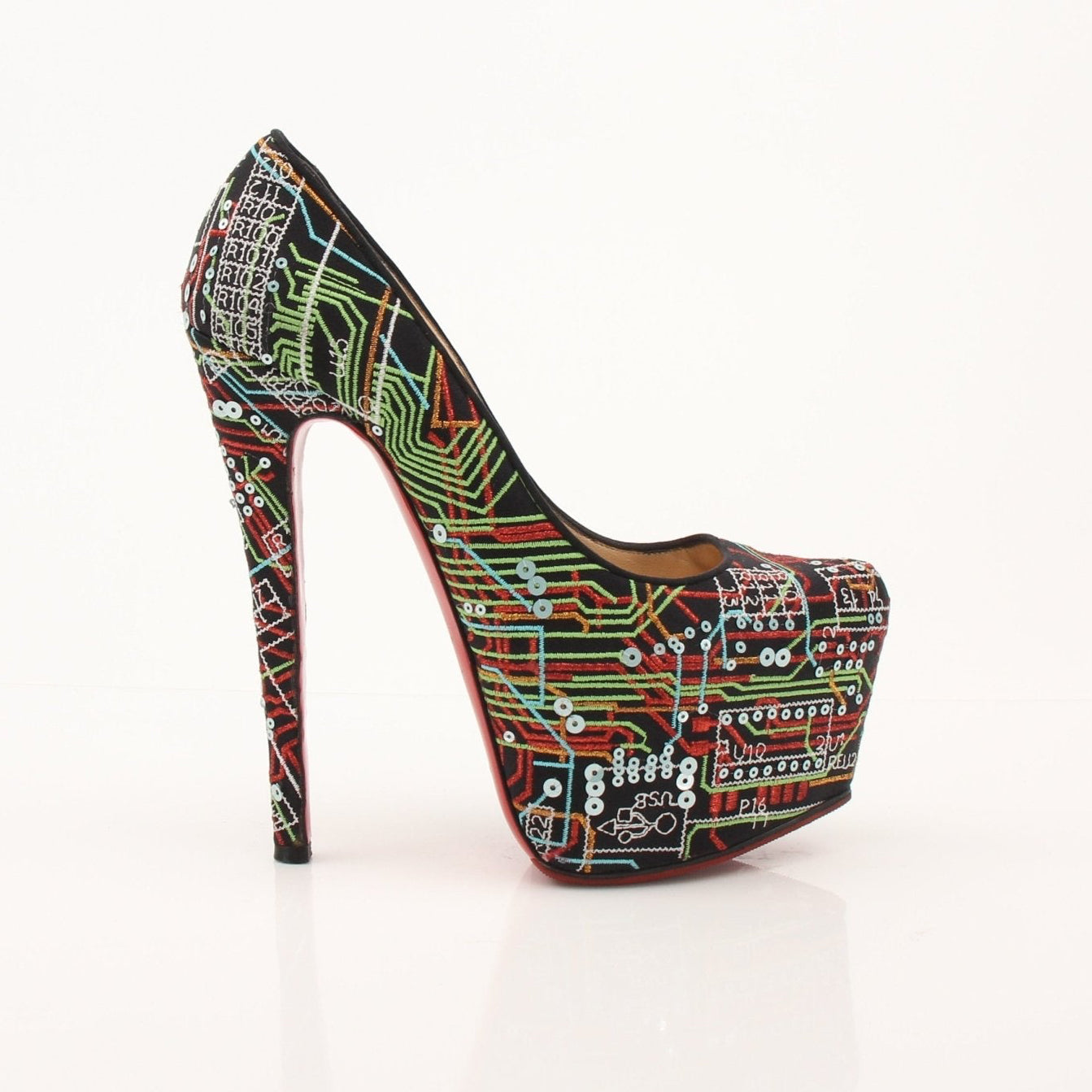 Christian Louboutin Lady Peep Geek Pumps heels with signature red soles, featuring pointed toes and sleek black leather design.