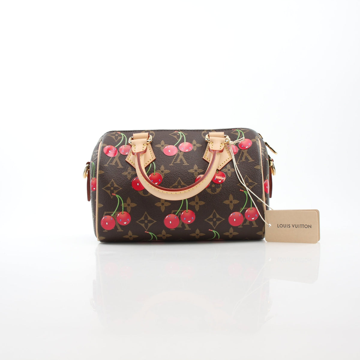 Louis Vuitton x Takashi Murakami Monogram Cerises Speedy Bandoulière 20 handbag with colorful cherry print and leather handles.