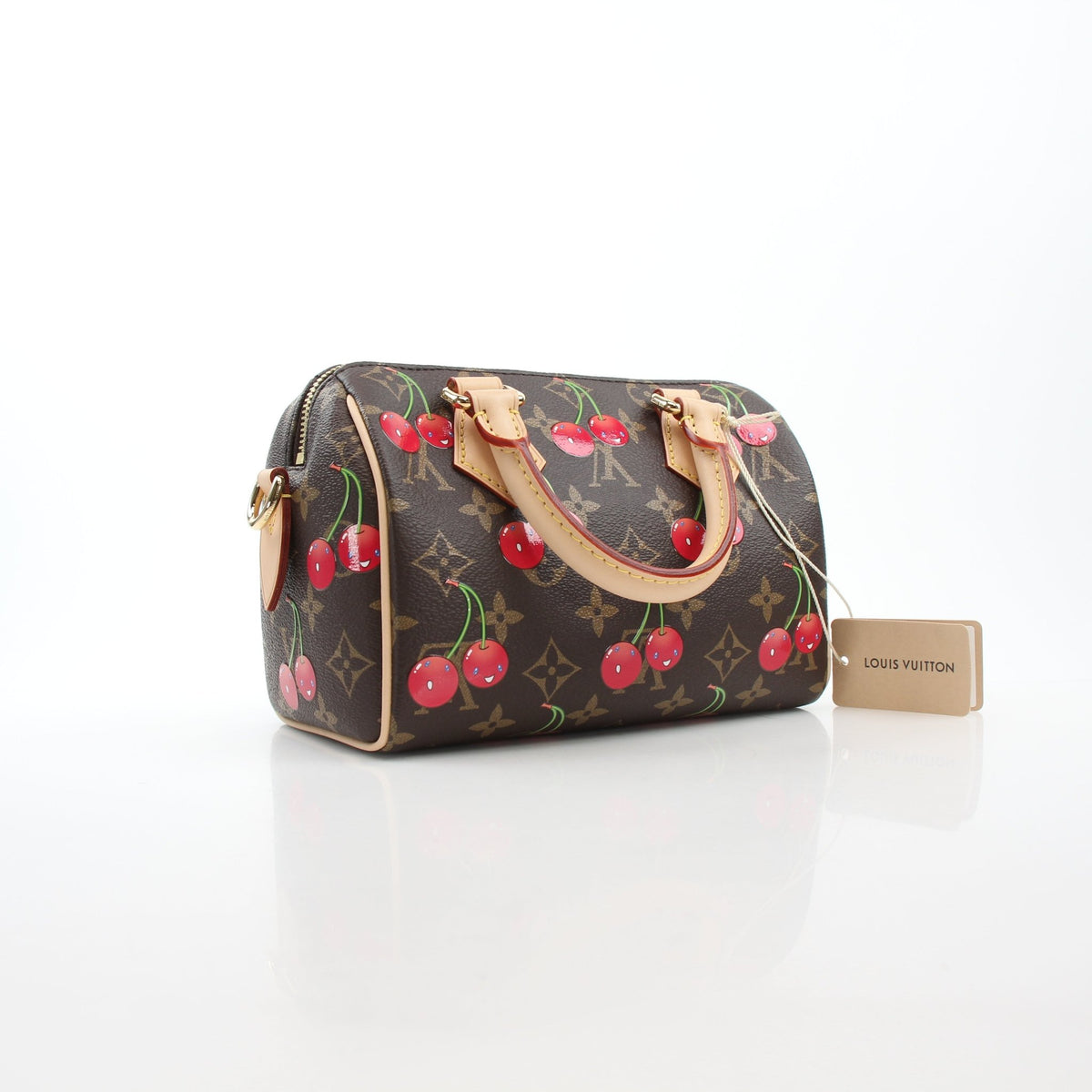 Louis Vuitton x Takashi Murakami Monogram Cerises Speedy Bandoulière 20 handbag with colorful cherry design and gold-tone hardware.
