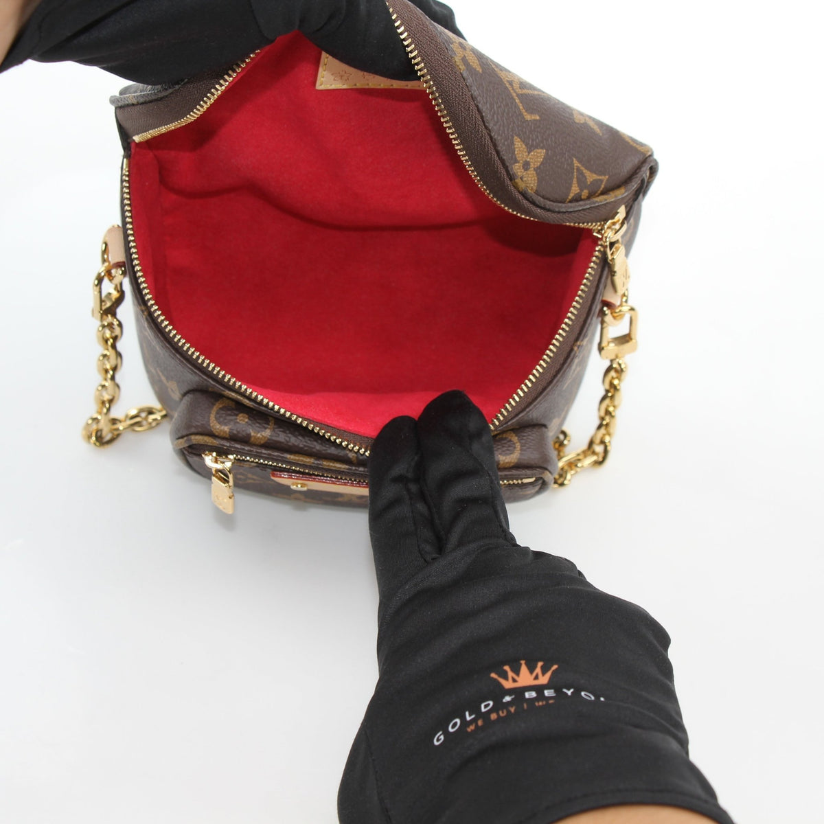 Louis Vuitton x Takashi Murakami Monogram Cerises mini bumbag handbag with colorful cherry print and gold accents.