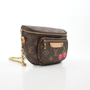 Louis Vuitton x Takashi Murakami Monogram Cerises mini bumbag handbag with colorful cherry design and gold hardware.