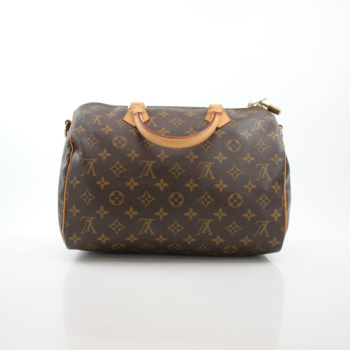 Louis Vuitton Speedy Bandoulière 30 handbag with leather handle, gold hardware, and signature monogram canvas.