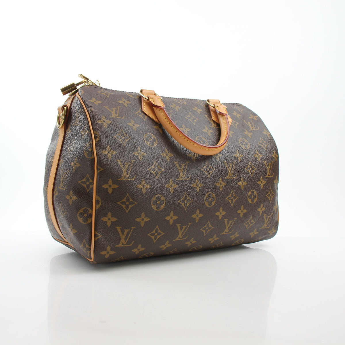 Louis Vuitton Speedy Bandoulière 30 handbag with classic monogram canvas and leather trim, featuring gold-tone hardware.