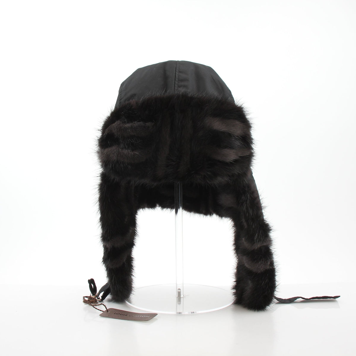Louis Vuitton Damier Checked Mink Trapper Hat in black, luxurious accessories with a distinctive patterned design and plush fur trim.