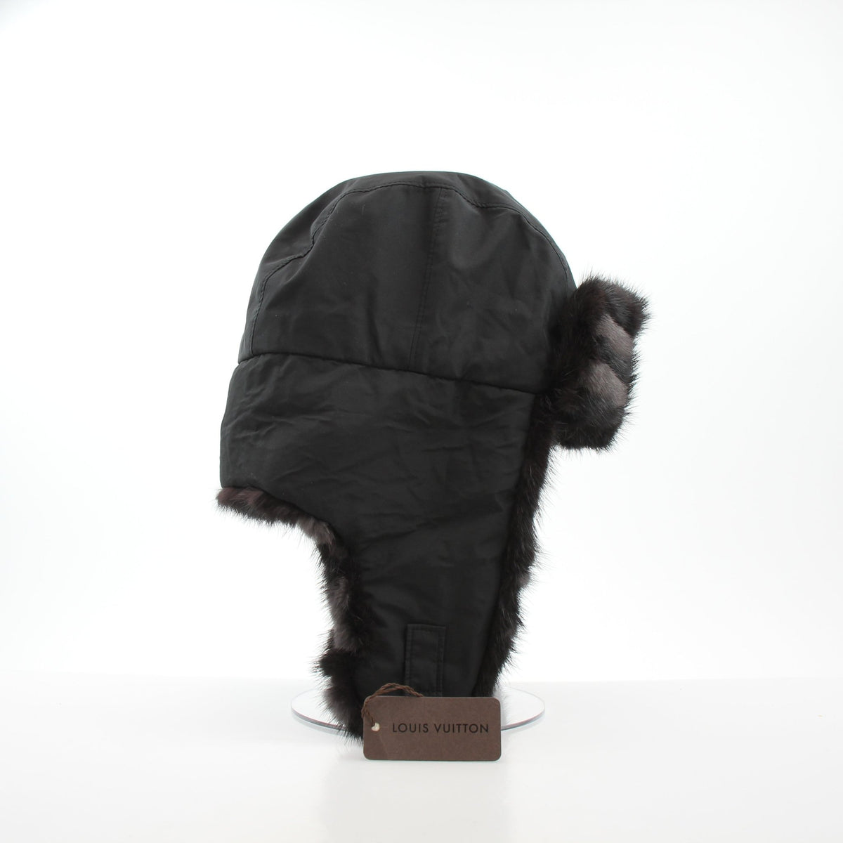 Louis Vuitton Damier checked mink trapper hat in black, stylish accessories with a checkered pattern and plush fur trim.