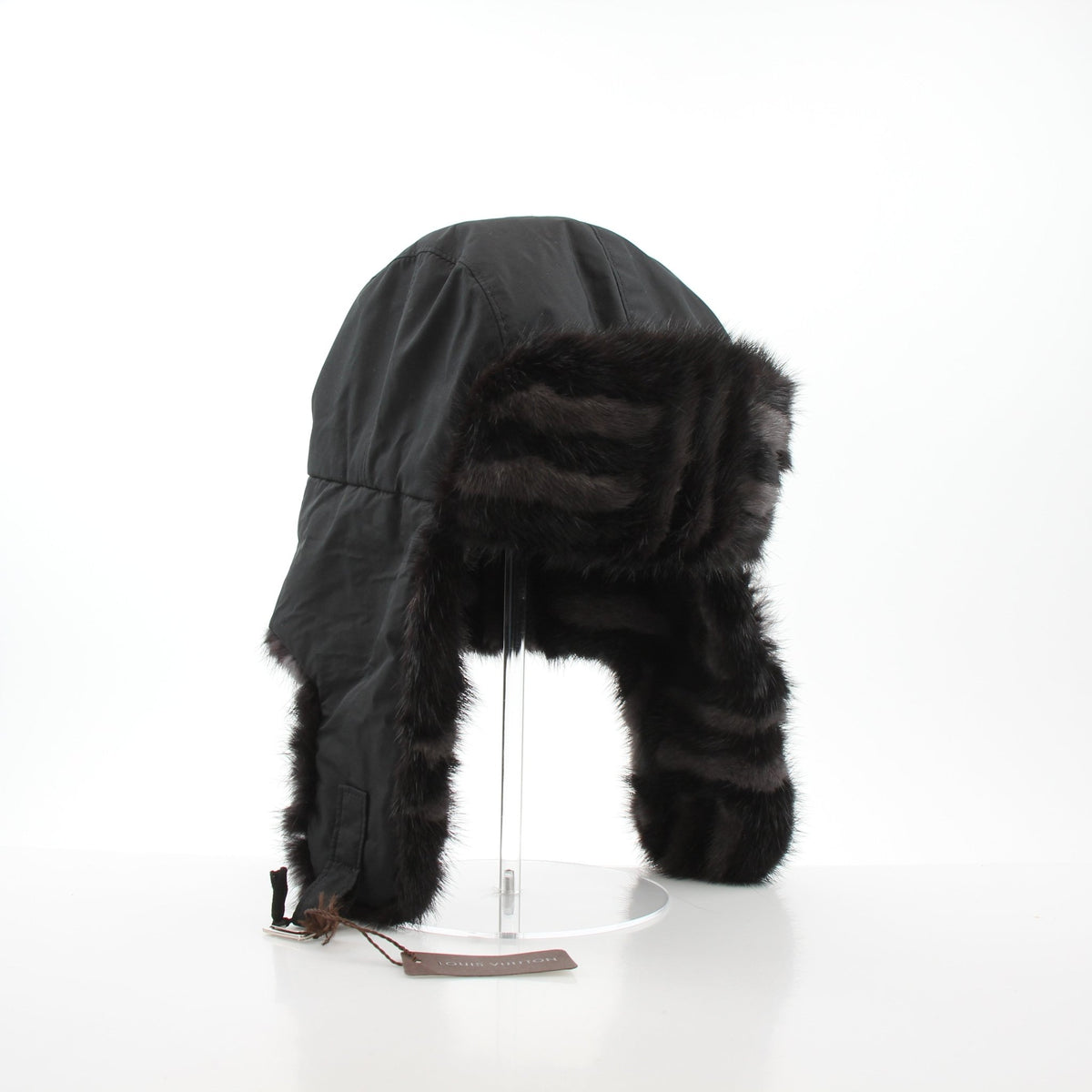 Louis Vuitton Damier checked mink trapper hat in black, stylish accessories with a patterned design and plush fur lining.