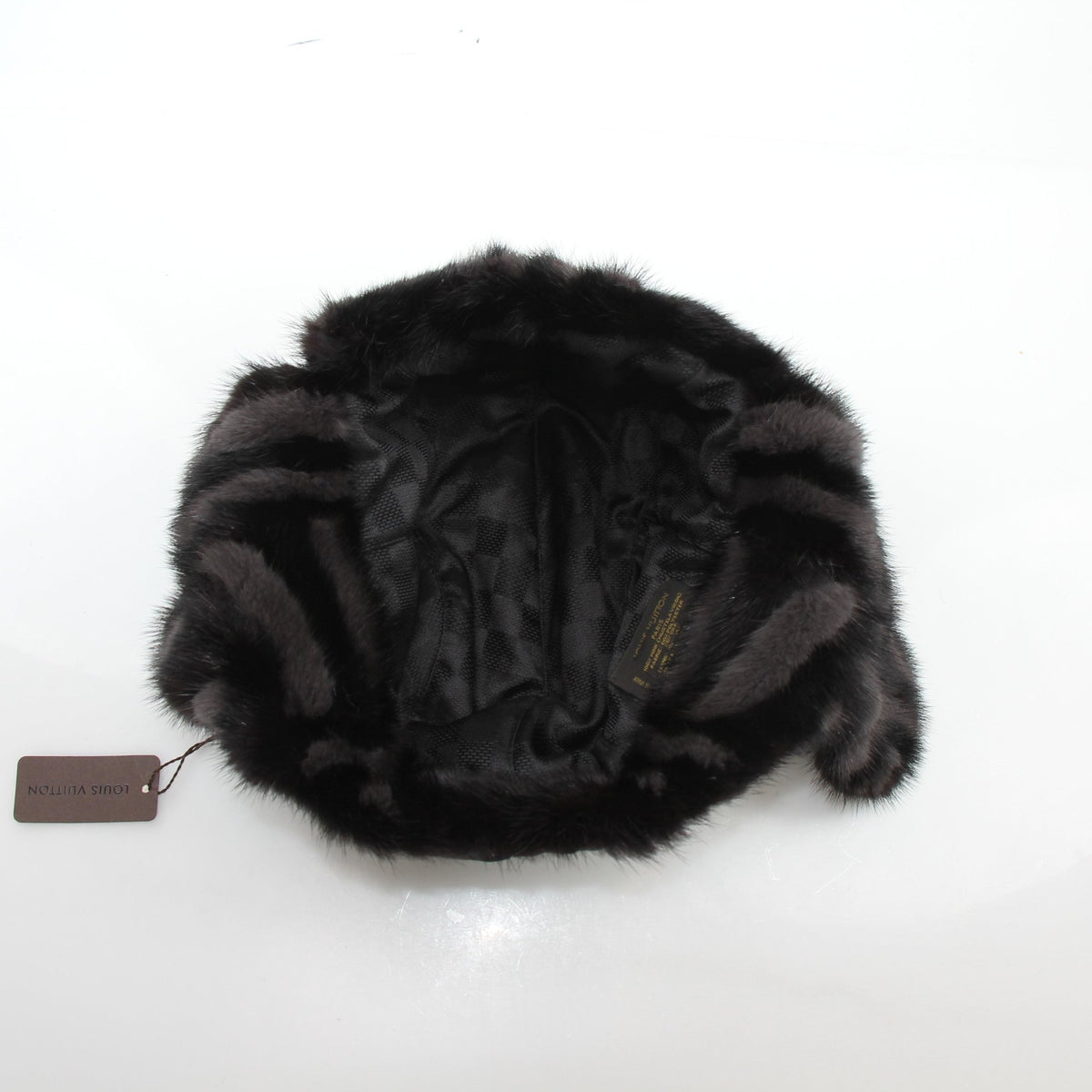 Louis Vuitton Damier checked mink trapper hat in black, stylish accessories with a warm, plush fur lining and checkered pattern.